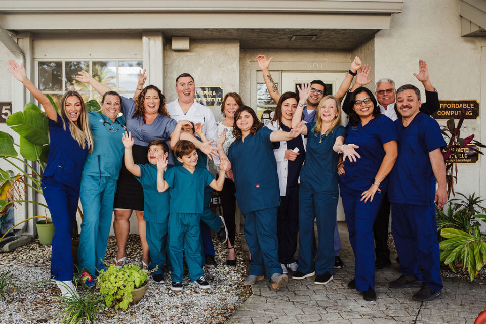 A group of people in blue uniforms. A group of people in blue uniforms.