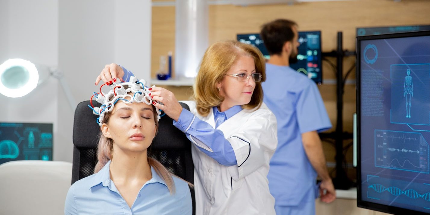 A woman is being examined by a doctor in a medical office.